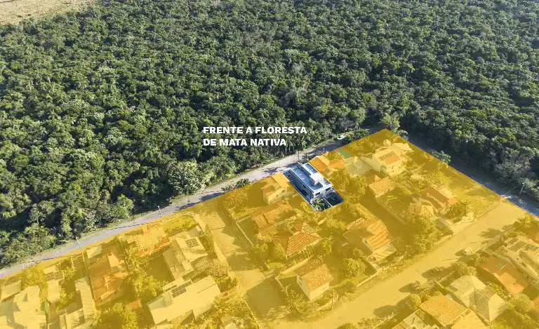 Aerial view showing houses bordering protected native Atlantic forest in south Florianópolis